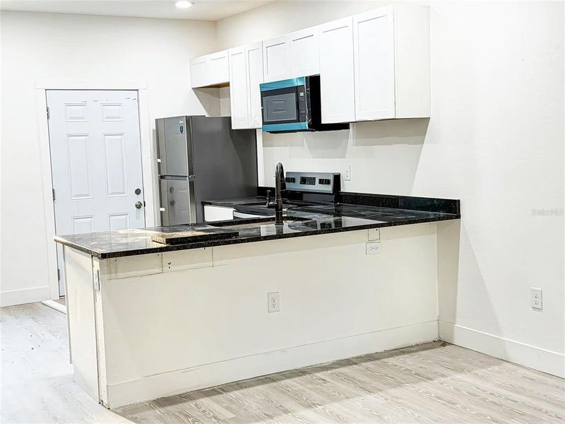 Furnished interior view inside a new home in , Interlachen (Image 6).