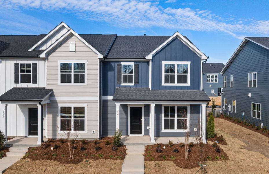 Front exterior of a new home in Saunders Farm, Willow Spring, NC, highlighting curb appeal (Image 17).
