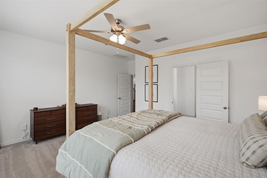 Private primary suite with room for a king bed, stylish furniture, and a true retreat feel. The perfect place to unwind at the end of the day.