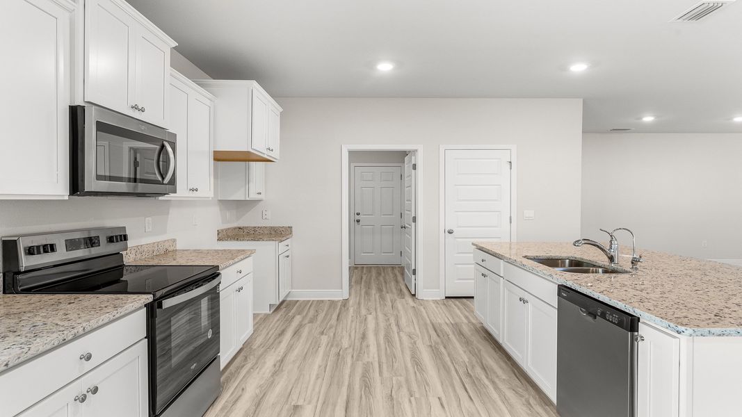 Representative furnished interior of a home built from the The Destin by D.R. Horton in Pine Creek and Heron Walk, Port St. Joe (Image 26).