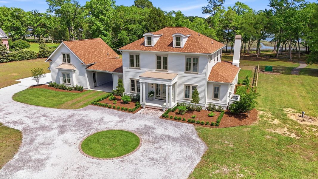 Front exterior of a new home in , Wadmalaw Island, SC, highlighting curb appeal (Image 22).