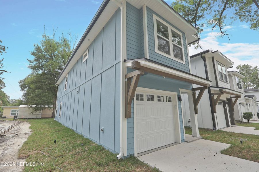 Front exterior of a new home in , Jacksonville, FL, highlighting curb appeal (Image 29). Front exterior of a new home in , Jacksonville, FL, highlighting curb appeal (Image 29).