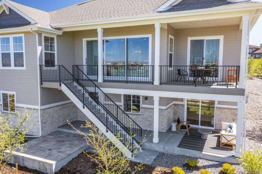 Exterior details and patio area of a home in Hilltop 55+ at Inspiration, Aurora (Image 26).