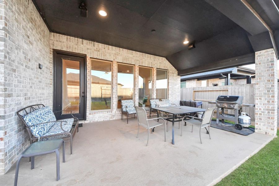 Covered patio perfect for grilling or relaxing Covered patio perfect for grilling or relaxing