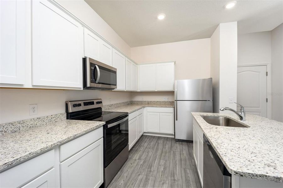 Furnished interior view inside a new home in Sol Vista, Dundee (Image 9).