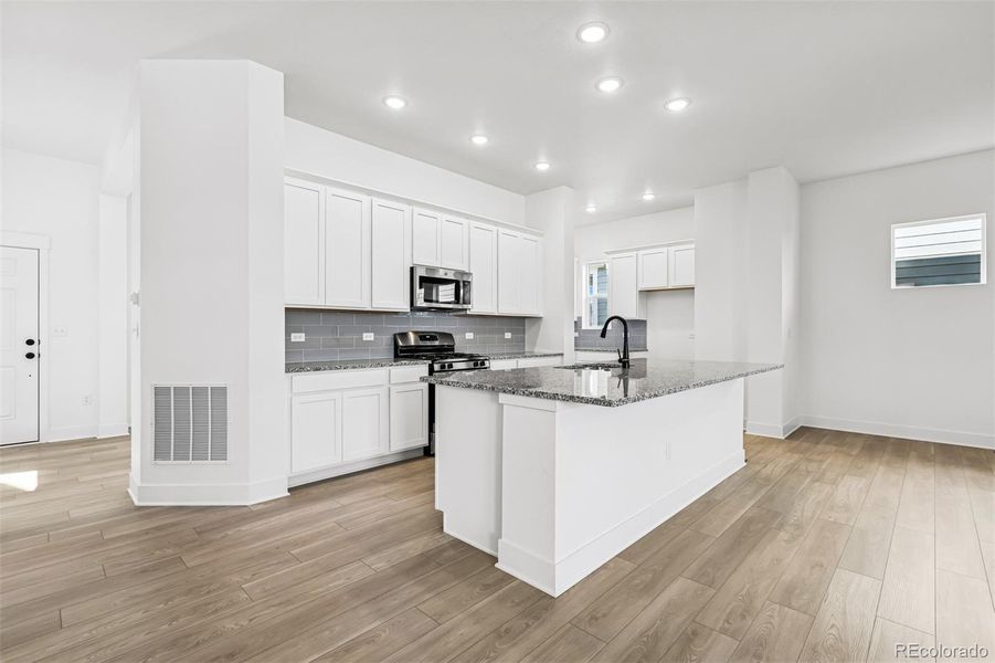 Furnished interior view inside a new home in Painted Prairie Cottage, Aurora (Image 10).