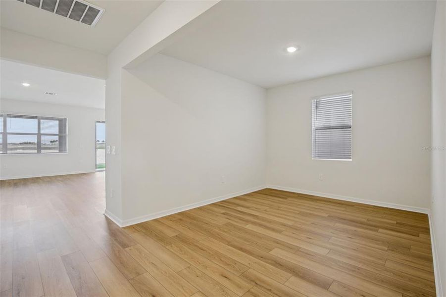 Spacious, unfurnished interior of a new home in Coasterra - Reserve Series, Palmetto (Image 28).