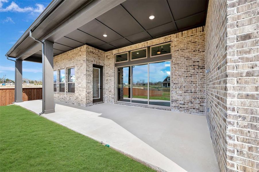 Exterior details and patio area of a home in Northshore at Lakewood Village - Classic Series, Lakewood Village (Image 3). Exterior details and patio area of a home in Northshore at Lakewood Village - Classic Series, Lakewood Village (Image 3).