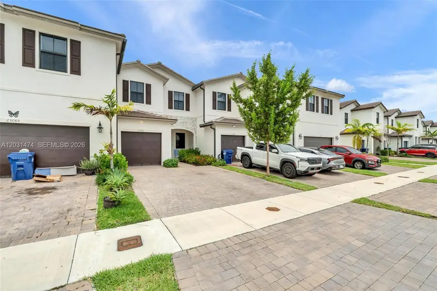Front exterior of a new home in , Miami, FL, highlighting curb appeal (Image 22).