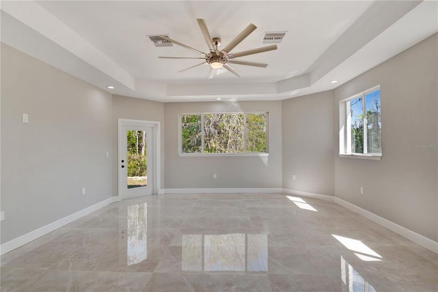 expansive bright master bedroom