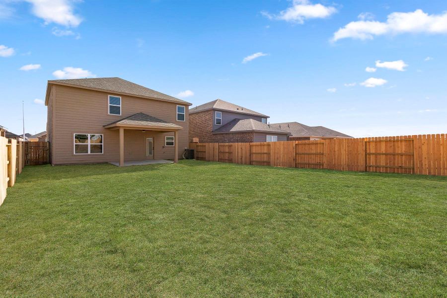 Exterior details and patio area of a home in Emberly, Beasley (Image 2).
