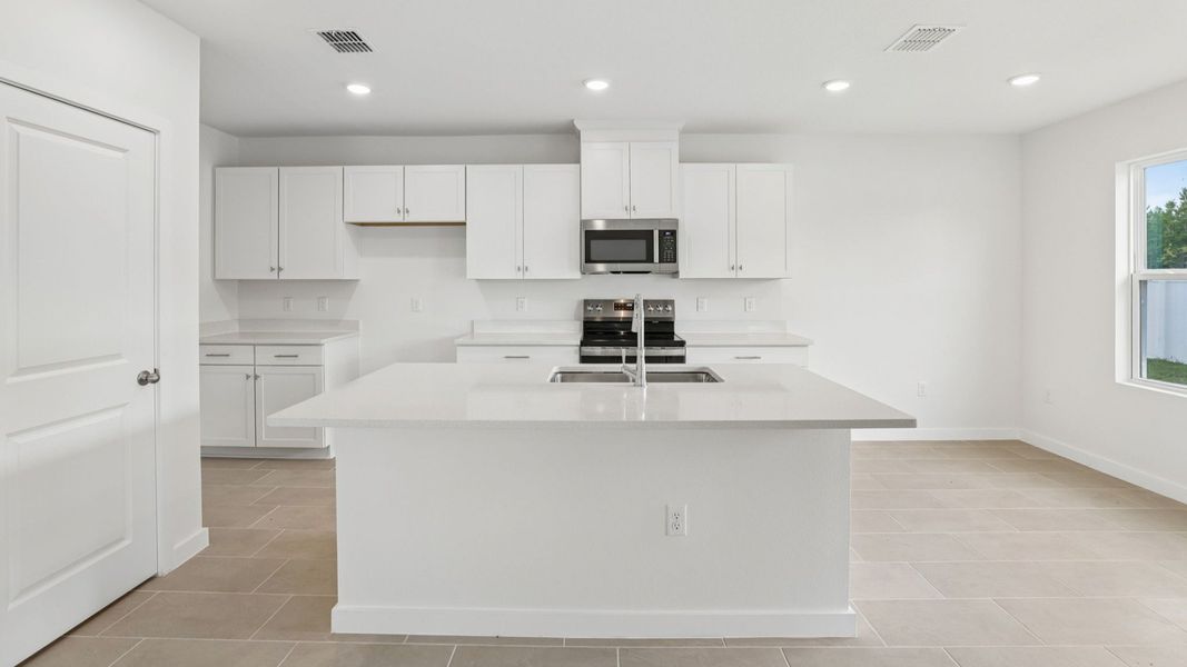 Furnished interior view inside a new home in Cyrene at Harmony, St. Cloud (Image 12).