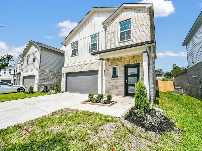 Exterior details and patio area of a home in Lakes at Black Oak, Magnolia (Image 3). Exterior details and patio area of a home in Lakes at Black Oak, Magnolia (Image 3).