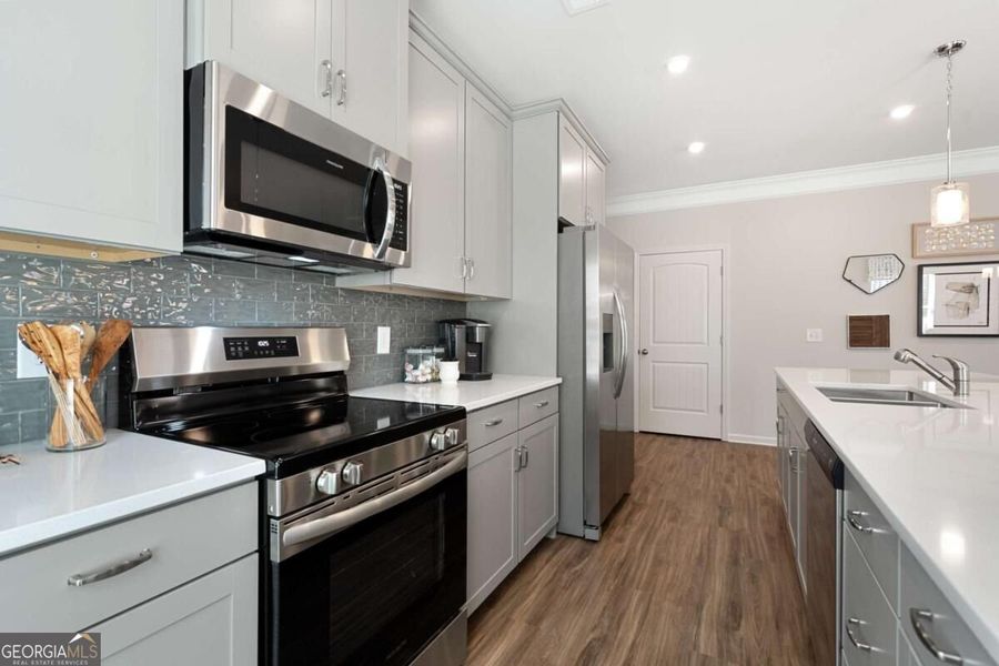 Furnished interior view inside a new home in Cobblestone Crossing Commons, Byron (Image 14).