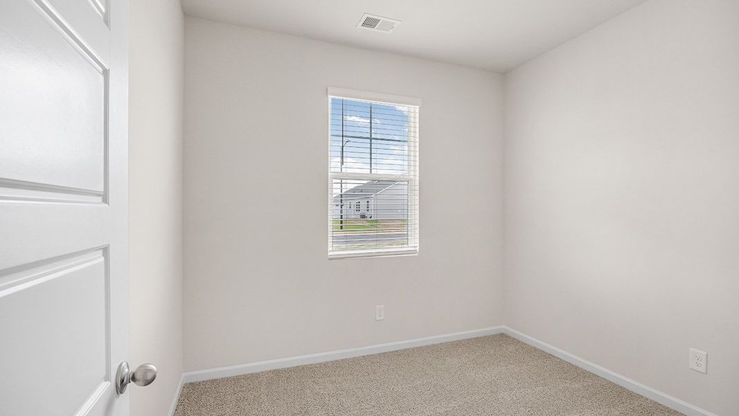Representative unfurnished interior of a home built from the Edgewood Express - Duplex by D.R. Horton in Remington Chase, Perry (Image 22).