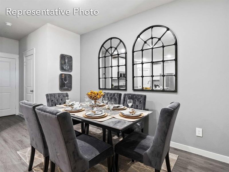 Dining room with hardwood / wood-style flooring