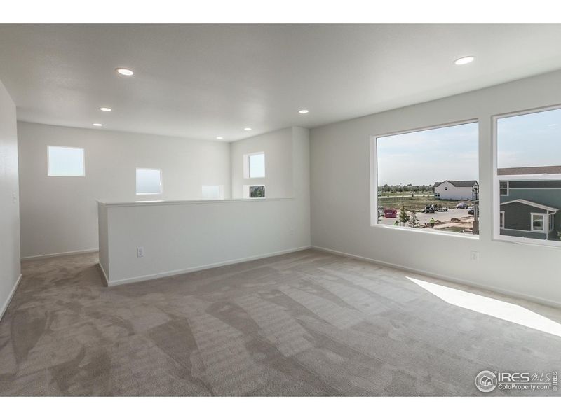 Spacious, unfurnished interior of a new home in Trailside Story Collection - Single Family Homes, Timnath (Image 26).