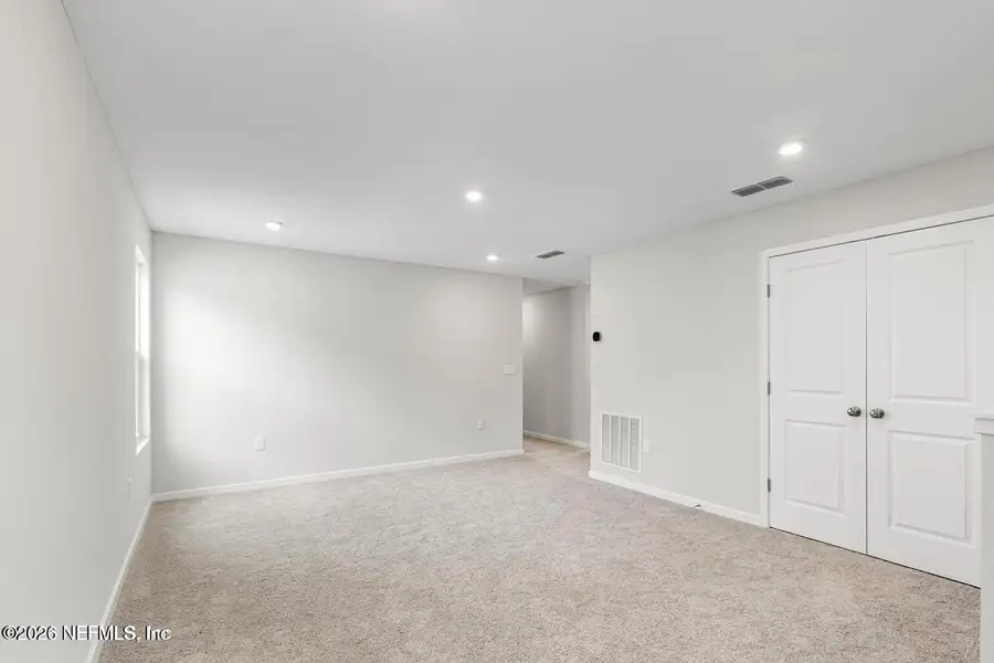 Spacious, unfurnished interior of a new home in The Landings at Pecan Park, Jacksonville (Image 12).
