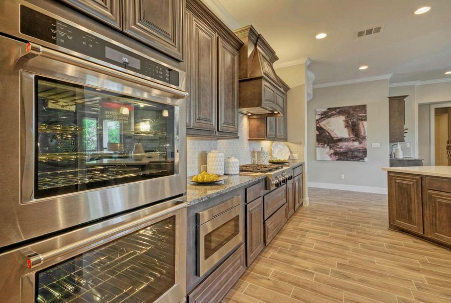 Representative furnished interior of a home built from the Madera II by Giddens Homes in Scofield Farms Estates, Georgetown (Image 154).