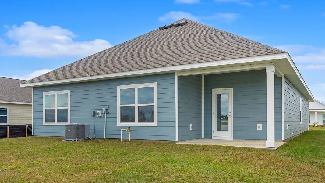 Exterior details and patio area of a home in Hodges Bayou Plantation, Panama City (Image 3).
