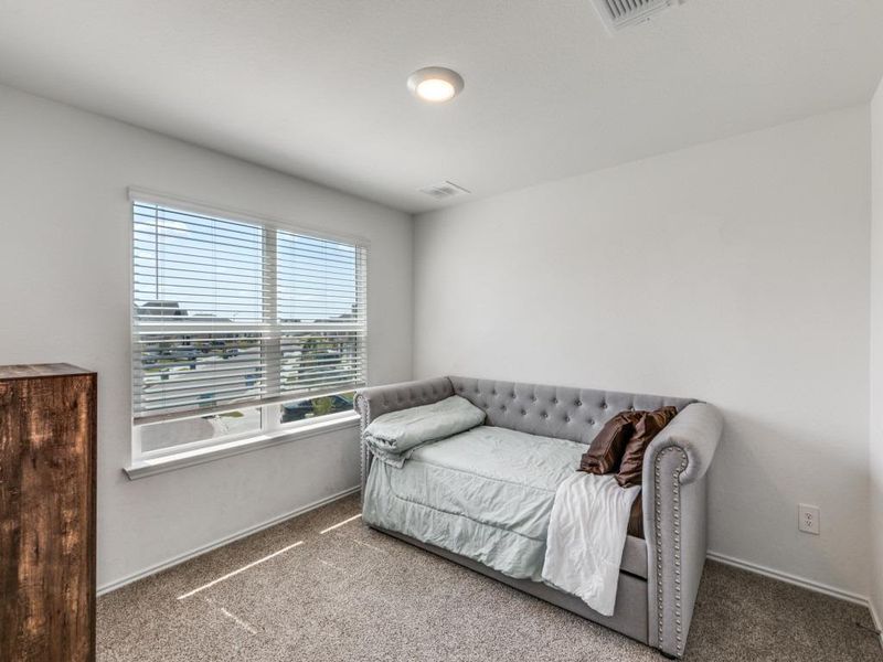 Bedroom featuring carpet flooring