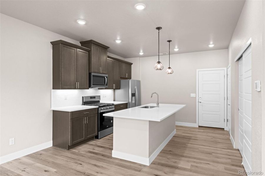 Furnished interior view inside a new home in Ralston Creek, Arvada (Image 7).