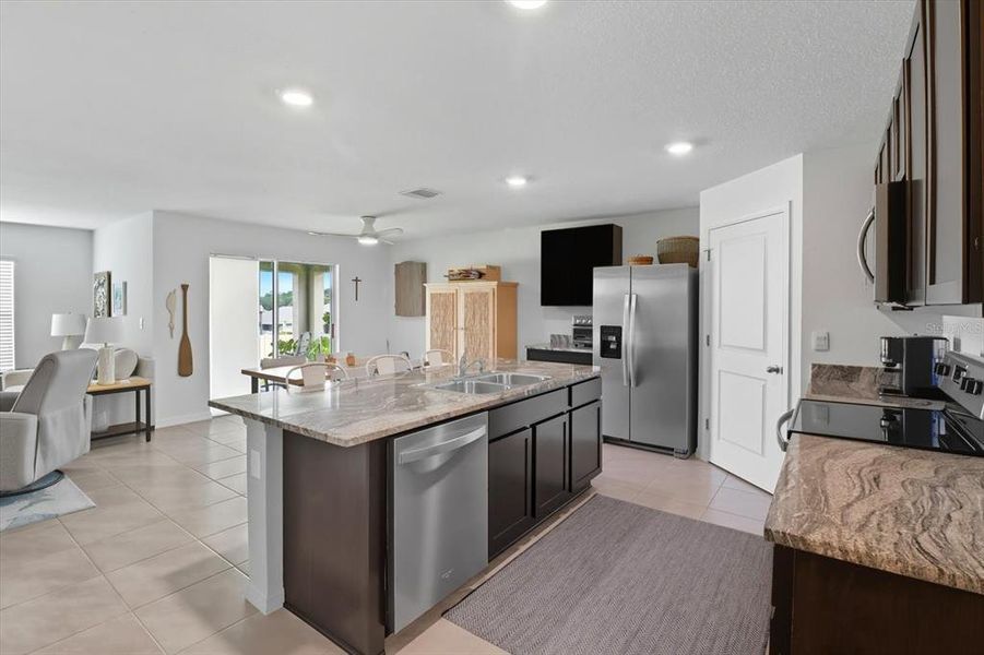 Furnished interior view inside a new home in Fairways at Twisted Oaks, Beverly Hills (Image 10).