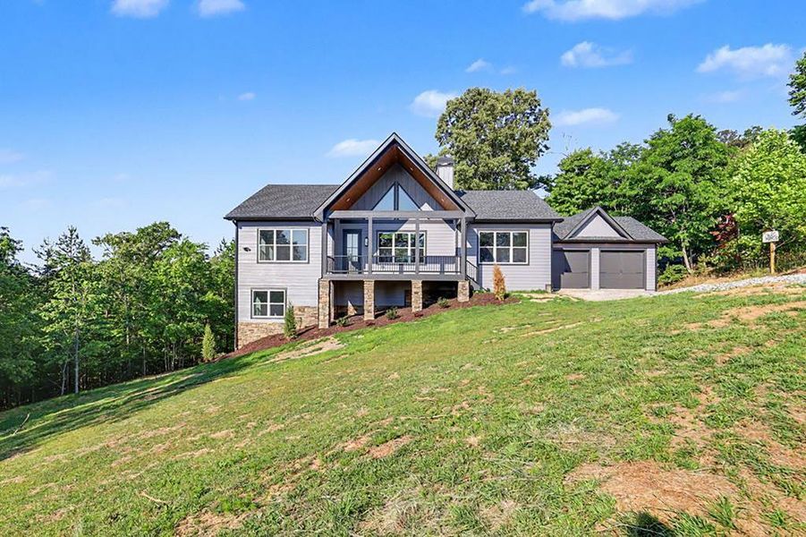 Front exterior of a new home in , Morganton, GA, highlighting curb appeal (Image 28). Front exterior of a new home in , Morganton, GA, highlighting curb appeal (Image 28).