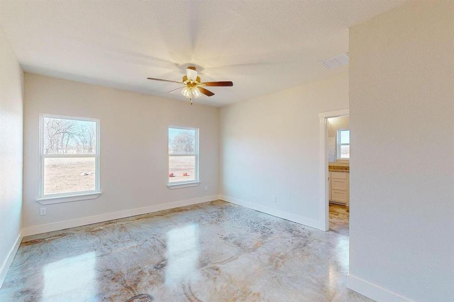 Unfurnished room with ceiling fan