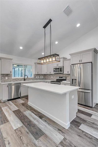 Furnished interior view inside a new home in , Dunnellon (Image 6).