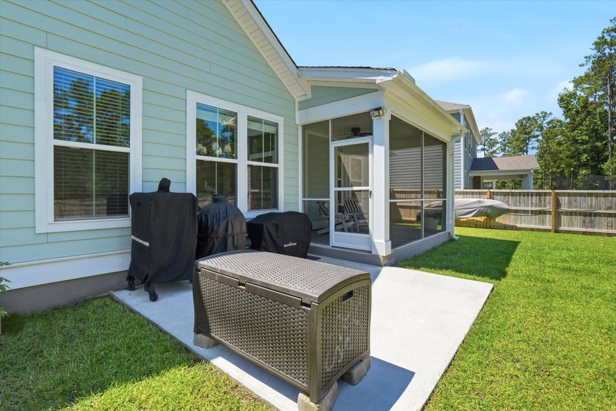 Exterior details and patio area of a home in Tidewater at Lakes of Cane Bay, Summerville (Image 4).