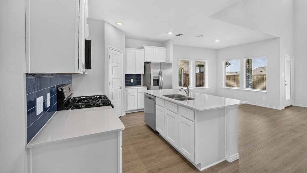 Representative furnished interior of a home built from the H231 Copaiba by D.R. Horton in Lilybrooke at Legacy Hills, Celina (Image 7).