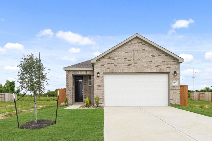 Front exterior of a new home in River Ranch Trails, Dayton, TX, highlighting curb appeal (Image 1). Front exterior of a new home in River Ranch Trails, Dayton, TX, highlighting curb appeal (Image 1).