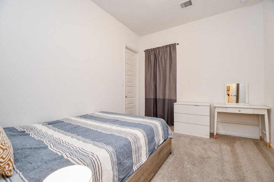 Furnished interior view inside a new home in Harvest Green 45', Richmond (Image 23). Furnished interior view inside a new home in Harvest Green 45', Richmond (Image 23).