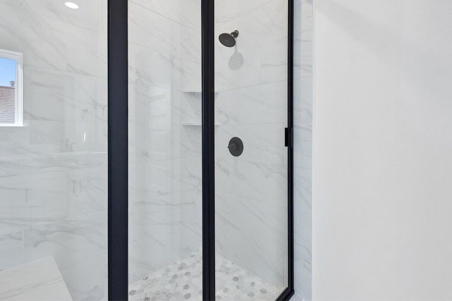 Full bathroom featuring a marble finish shower
