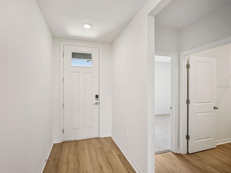 Spacious, unfurnished interior of a new home in The Reserve at Van Oaks, Auburndale (Image 25).