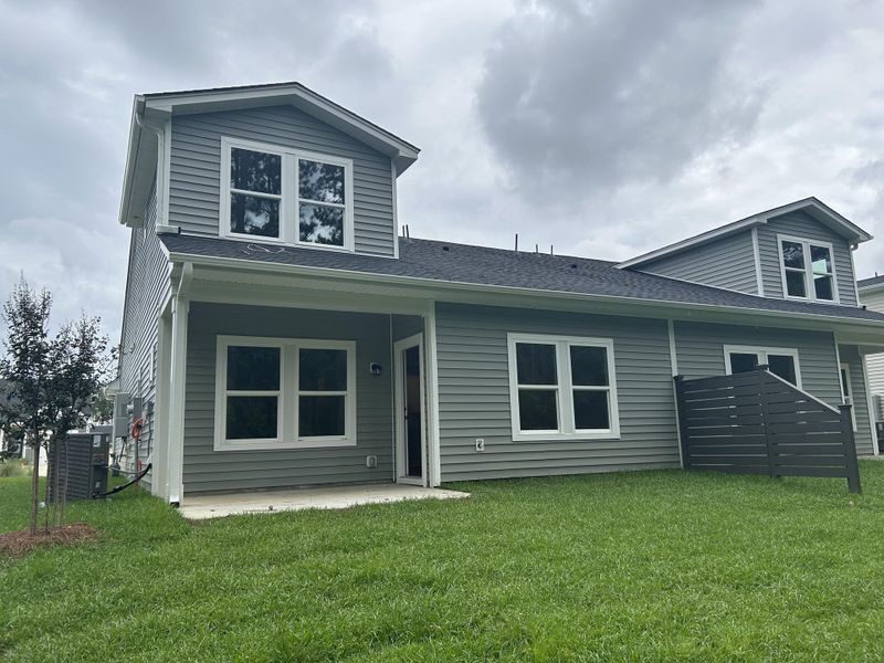 Front exterior of a new home in Hammock Walk at Nexton, Summerville, SC, highlighting curb appeal (Image 1). Front exterior of a new home in Hammock Walk at Nexton, Summerville, SC, highlighting curb appeal (Image 1).