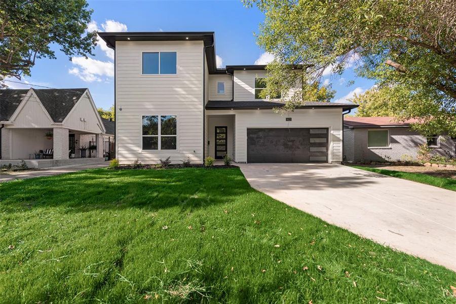 Front exterior of a new home in , Dallas, TX, highlighting curb appeal (Image 17).