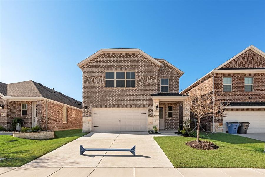 Front exterior of a new home in Walden Pond, Forney, TX, highlighting curb appeal (Image 19).