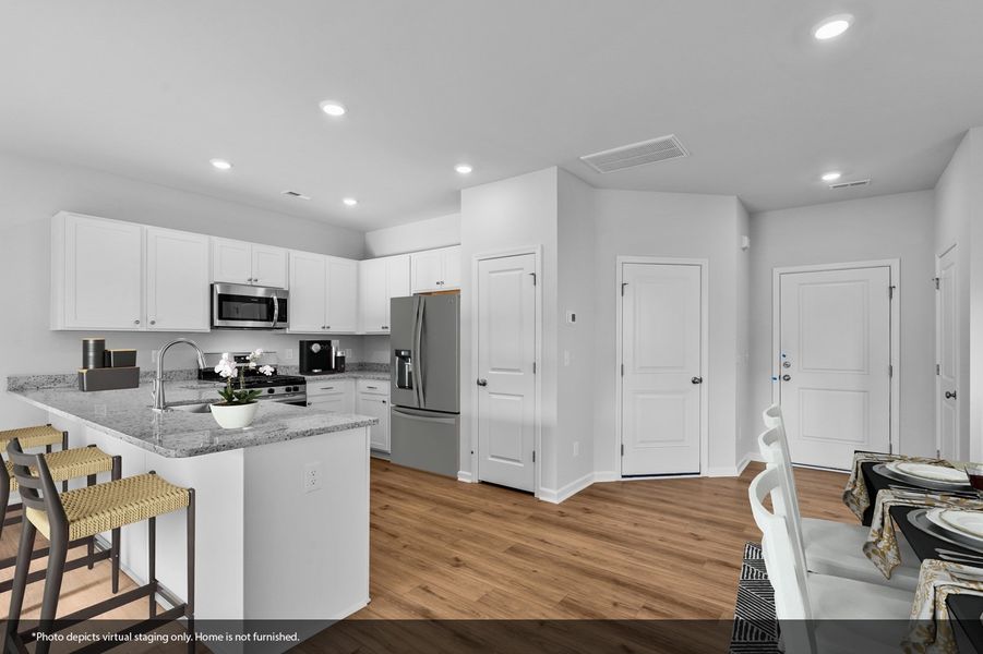 Furnished interior view inside a new home in Hanes Lake, Winston-Salem (Image 6). Furnished interior view inside a new home in Hanes Lake, Winston-Salem (Image 6).