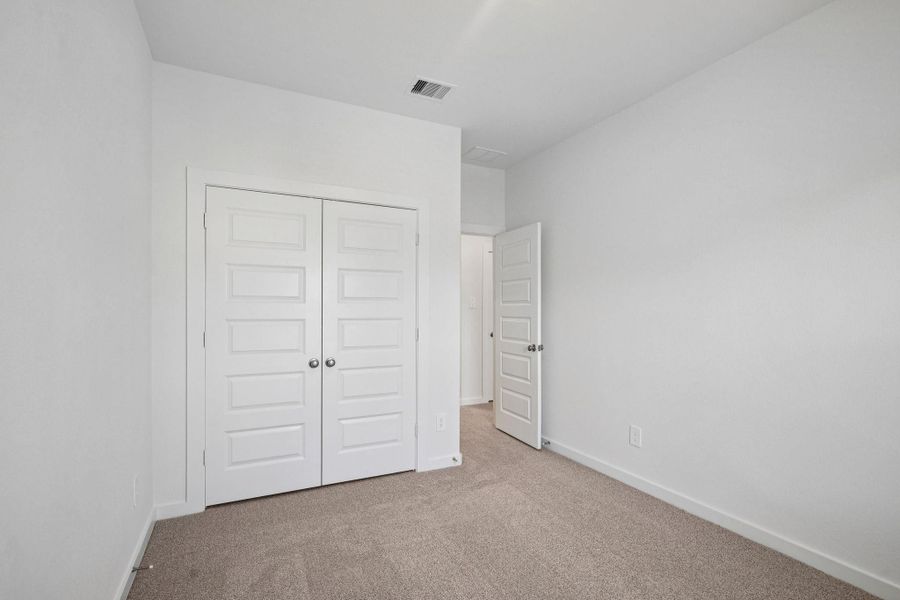 Spacious, unfurnished interior of a new home in Kemah Crossing - City Series, Kemah (Image 23). Spacious, unfurnished interior of a new home in Kemah Crossing - City Series, Kemah (Image 23).