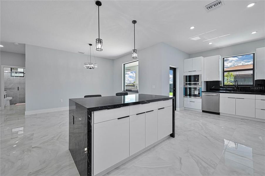 Furnished interior view inside a new home in , Cape Coral (Image 12). Furnished interior view inside a new home in , Cape Coral (Image 12).