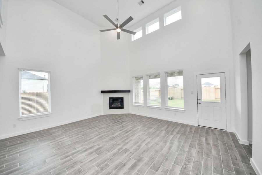 Take another glimpse into the heart of the home with this additional view of the family room—a sprawling space ready to accommodate all your gatherings. Take another glimpse into the heart of the home with this additional view of the family room—a sprawling space ready to accommodate all your gatherings.