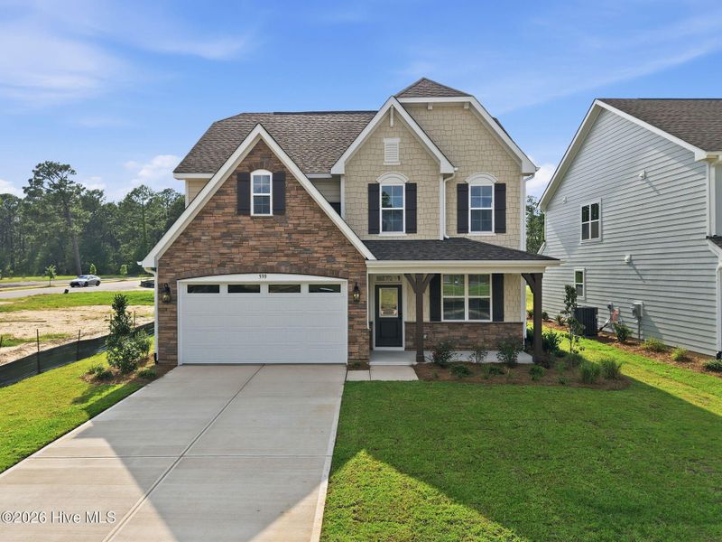 Front exterior of a new home in Legacy Lakes, Aberdeen, NC, highlighting curb appeal (Image 2).