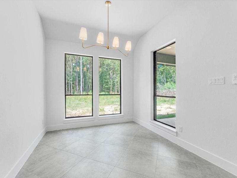 Dining nook has a perfect view of your backyard.