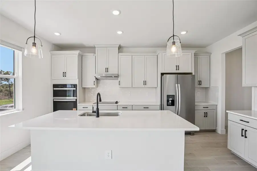 Furnished interior view inside a new home in Magnolia Bay - Reserve Series, Nokomis (Image 9).