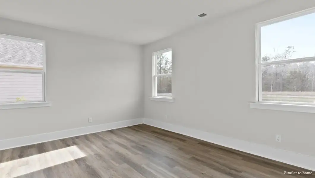 Spacious, unfurnished interior of a new home in The Highlands at Cedar Hill Landing, Navassa (Image 25).