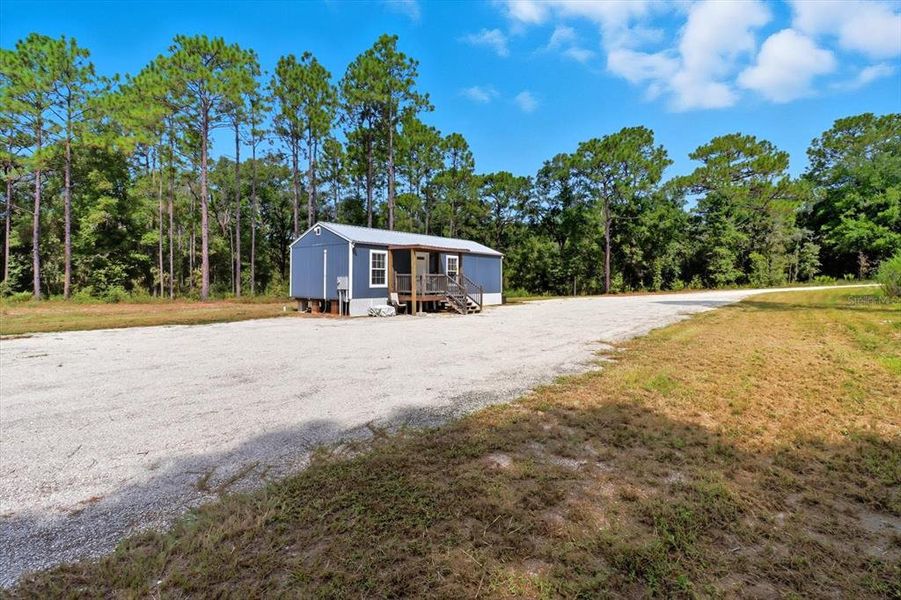 Front exterior of a new home in , Dunnellon, FL, highlighting curb appeal (Image 20). Front exterior of a new home in , Dunnellon, FL, highlighting curb appeal (Image 20).