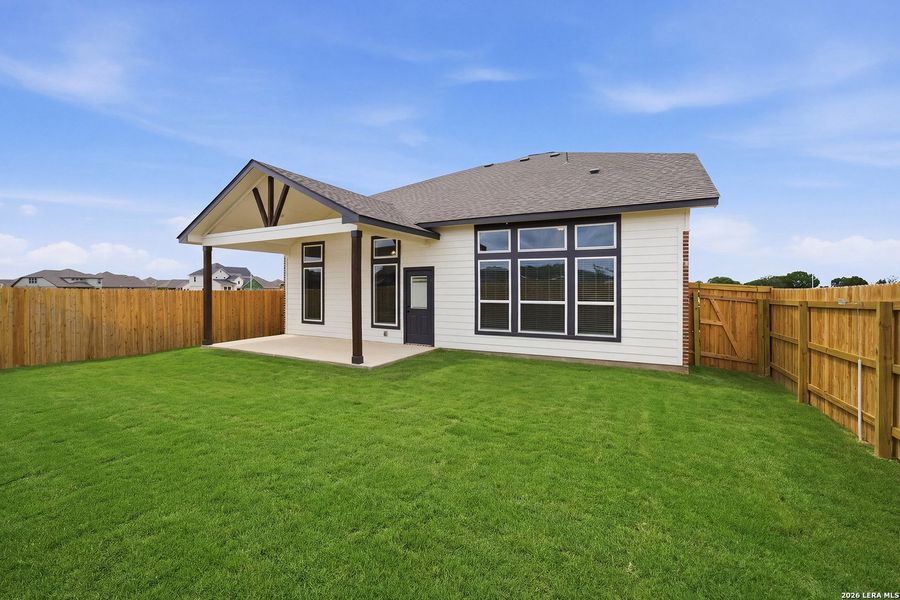Exterior details and patio area of a home in Megan's Landing, Castroville (Image 4).
