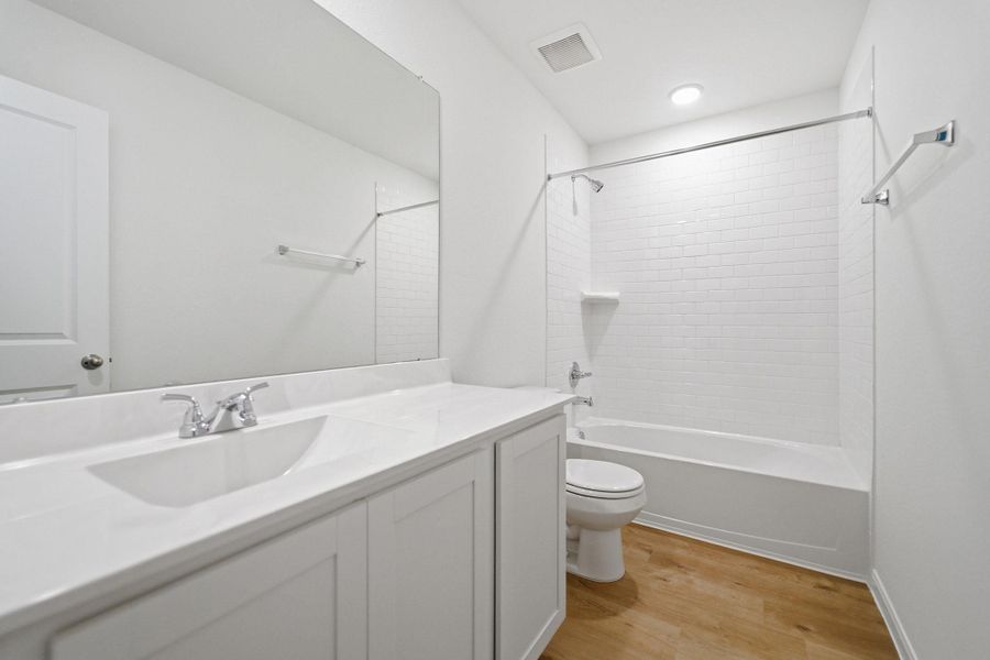 Furnished interior view inside a new home in , Conroe (Image 4).